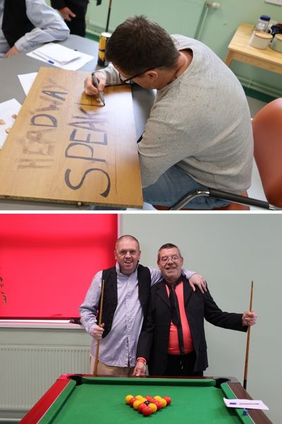 Above: Man in grey jumper colouring a cardboard sign for the show. Below: Two men in 1920s dress smiling at the camera in front of a pool table.