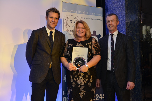 Charlie collects her Carer of the Year Award in 2015