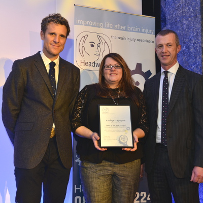 Kathryn collects her Headway Carer of the Year Award