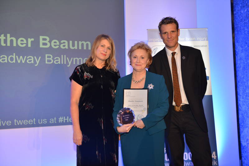Heather Beaumont (centre) collecting her award
