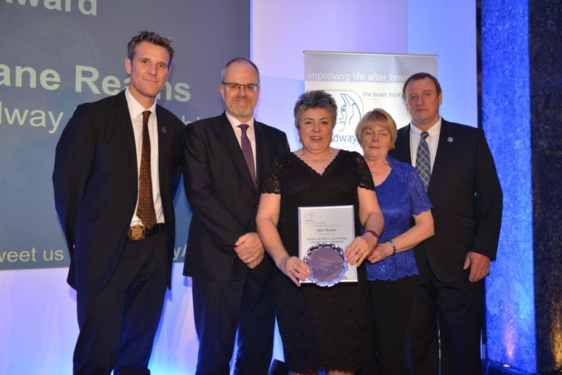 Jane Reams (centre) collecting her award