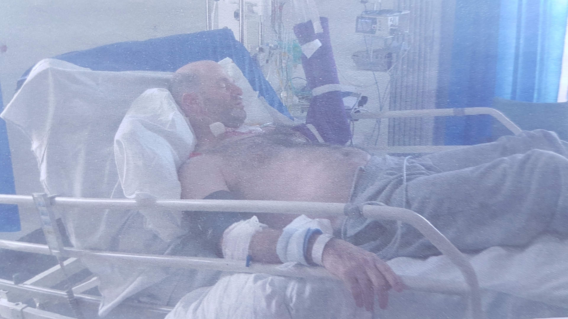 Marco in his hospital bed following the crash