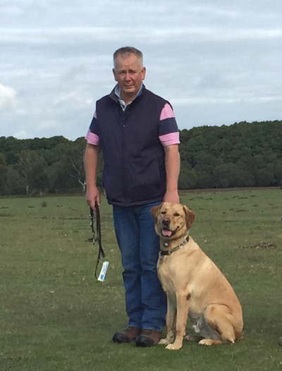 Headway volunteer Paul with his guide dog Joey