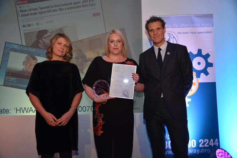 Natasha Cassidy collects her Headway Carer of the Year Award