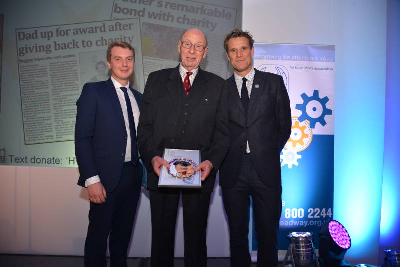 Sandy Johnston collects his Headway Volunteer of the Year Award