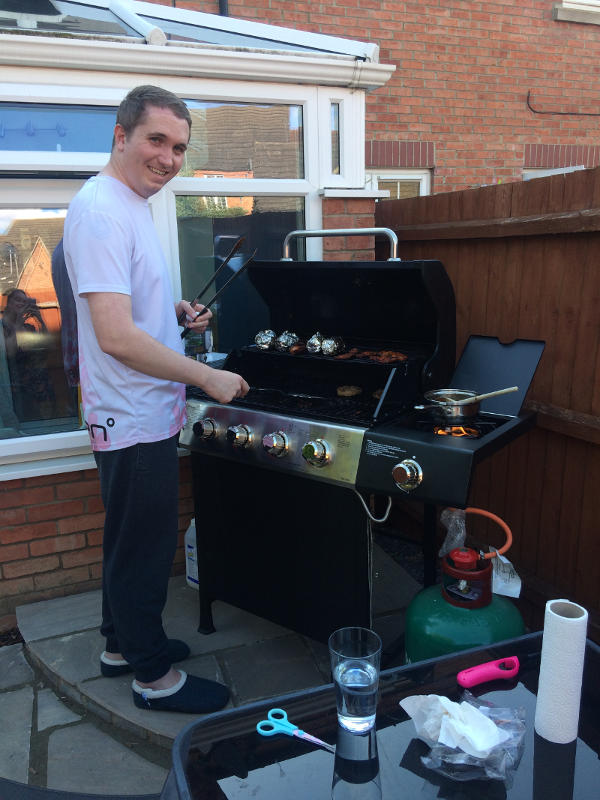 Eventually, Daniel was able to relearn skills like cooking. Here, he takes on his first barbecue!