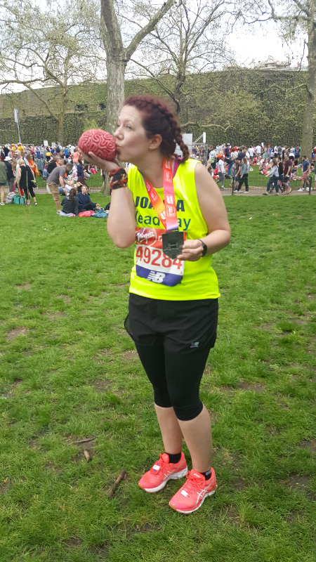 Joanna Brown with a brain model in her London Marathon t-shirt