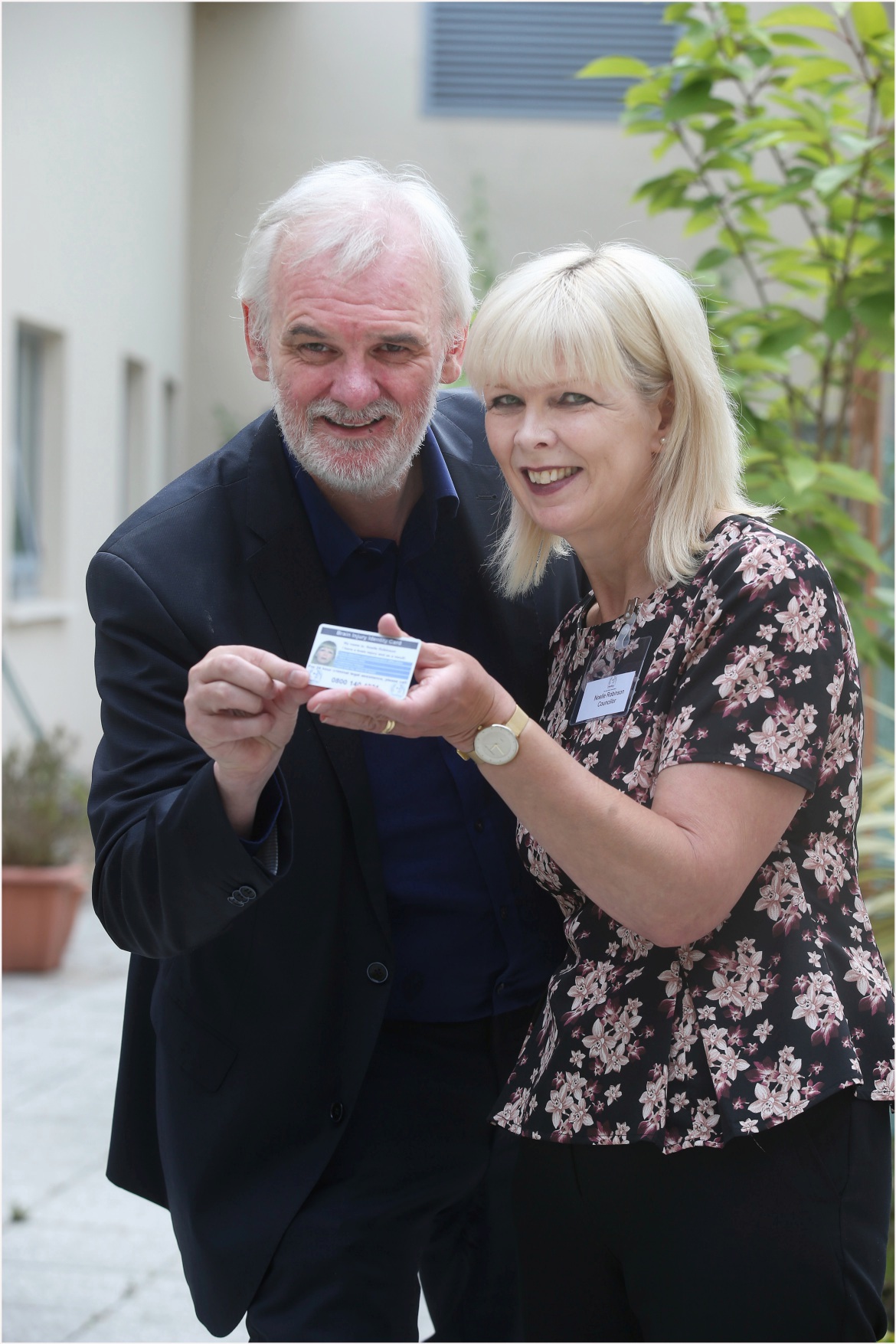 Noelle pictured with comedian Tim McGarry at the launch of the card in Northern Ireland.