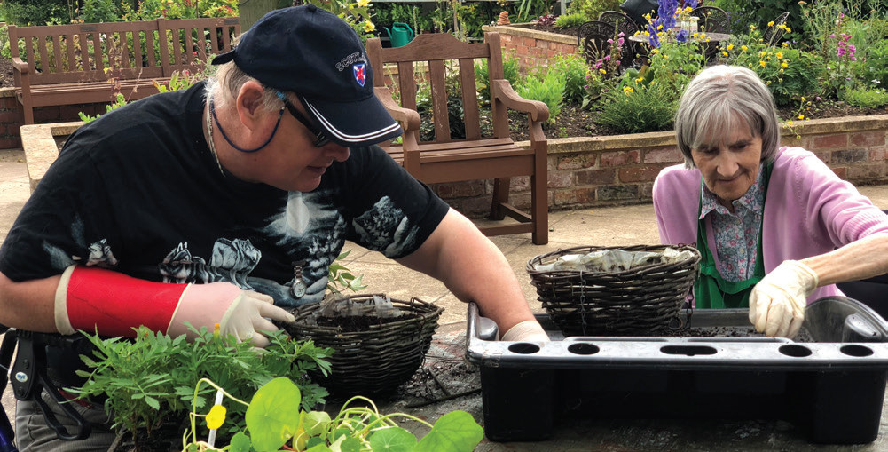 Les Wargen and Pauline Perry enjoy a gardening session at Herefordshire Headway