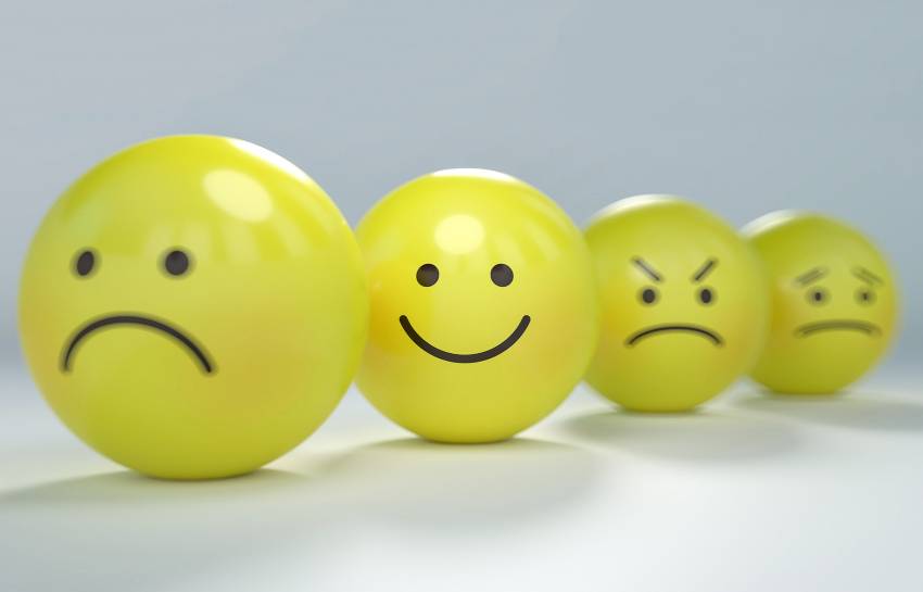 balls with emotion faces