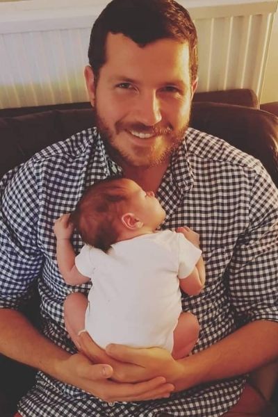 Proud dad Thomas with his daughter