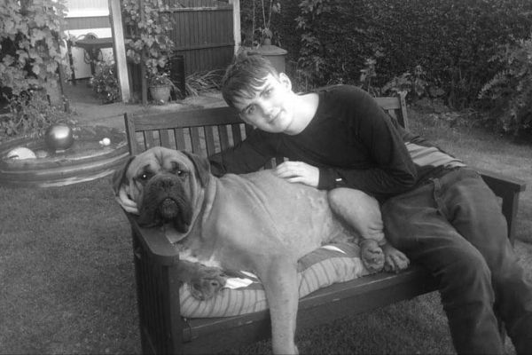 Brandon with his dog, Bruno